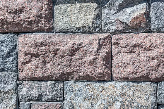 Abbildung einer Natursteinmauer aus Granit